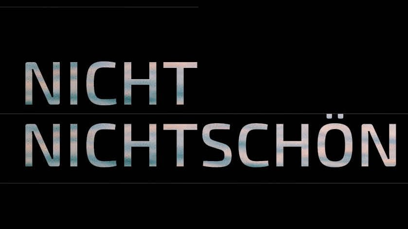 Lettering of "Nicht nichtschön" ("not not beautiful") against black background